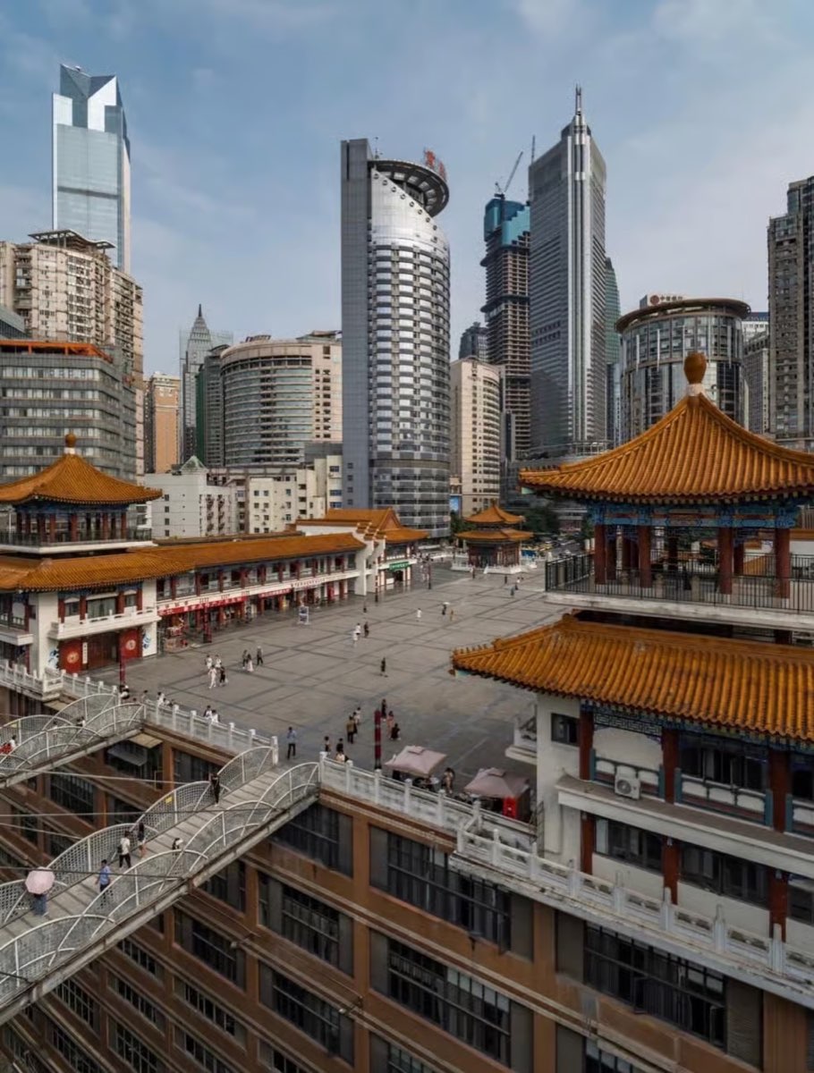 Kuixinglou's traditional roofs, elevated walkways and surrounding towers