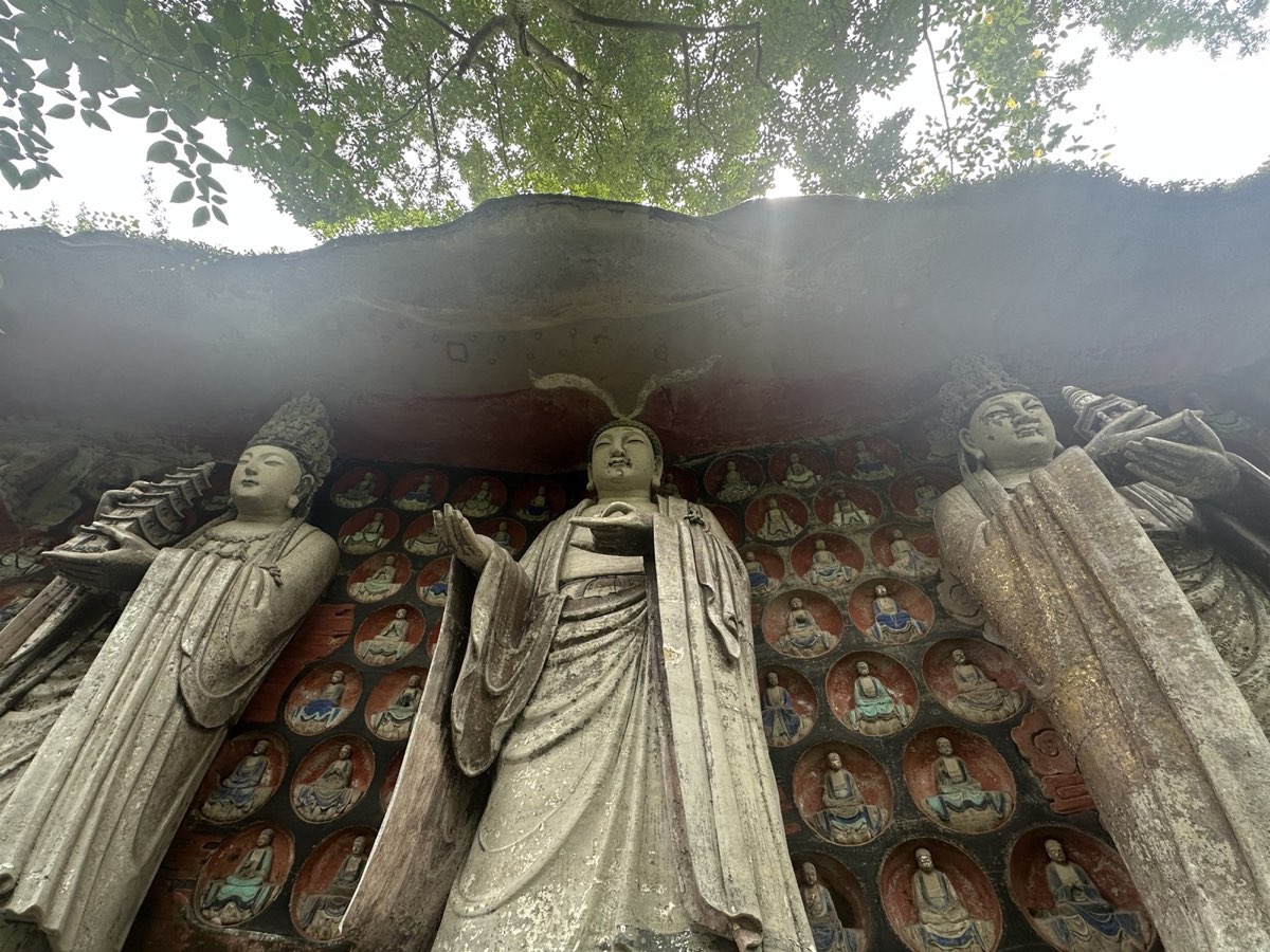 Buddhist figures carved into the Baodingshan cliff