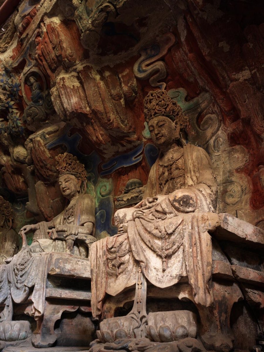 Painted figures and detailed grotto art at Beishan