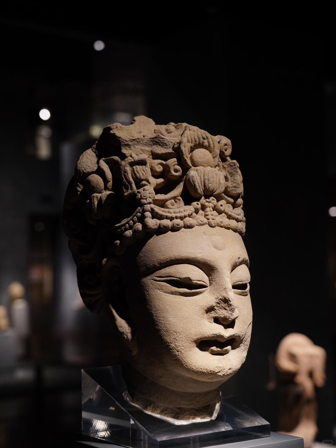 A sculpture detail displayed in Dazu Rock Carvings Museum